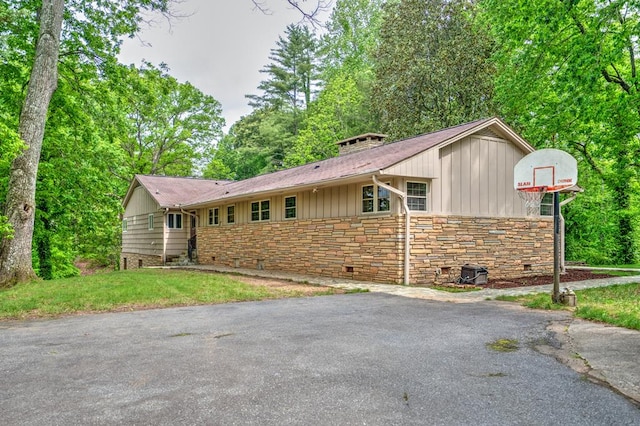 241 Boulevard St, Murphy, NC 28906 - view of front of house with stone siding, board and batten siding, and a front lawn