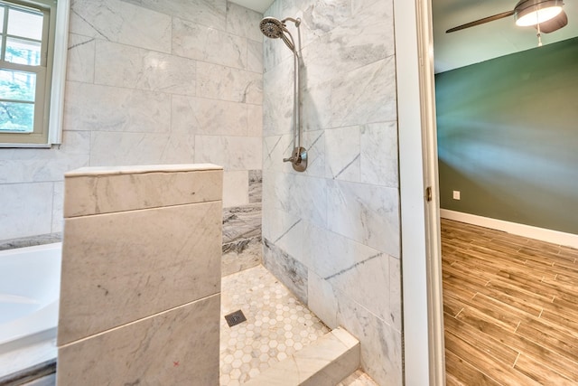 241 Boulevard St, Murphy, NC 28906 - bathroom with a tile shower, wood finished floors, and ceiling fan