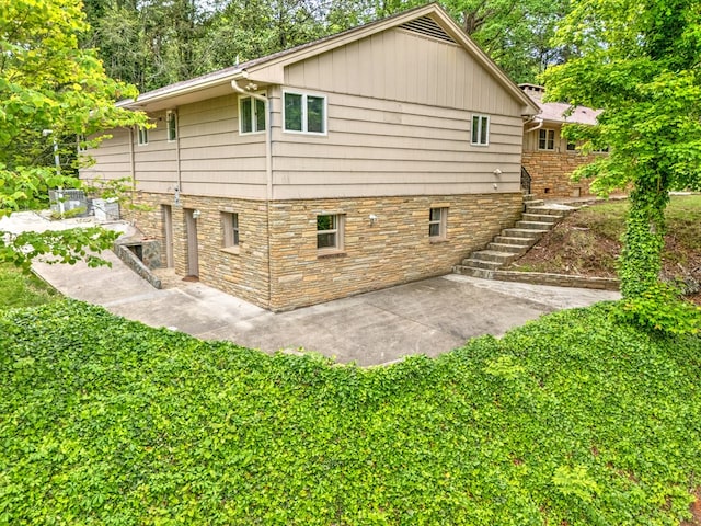 241 Boulevard St, Murphy, NC 28906 - view of home's exterior with a patio area and stairway