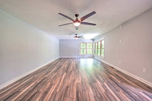 241 Boulevard St, Murphy, NC 28906 - empty room featuring dark wood-style flooring, ceiling fan, and baseboards