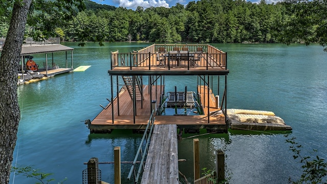 dock area featuring a water view and boat lift