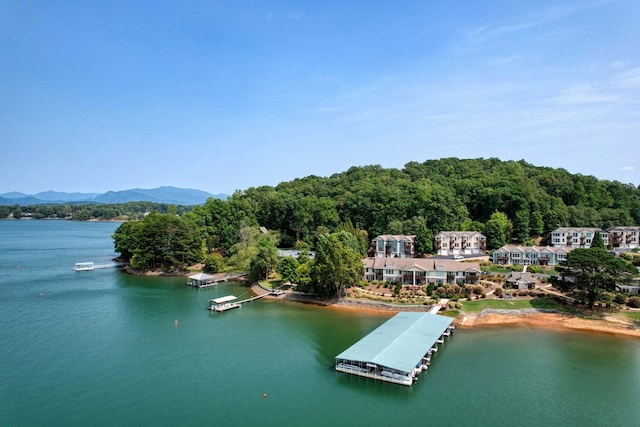 bird's eye view with a water and mountain view