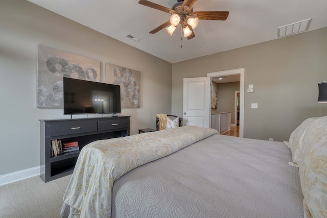 bedroom featuring a ceiling fan, carpet flooring, baseboards, and visible vents