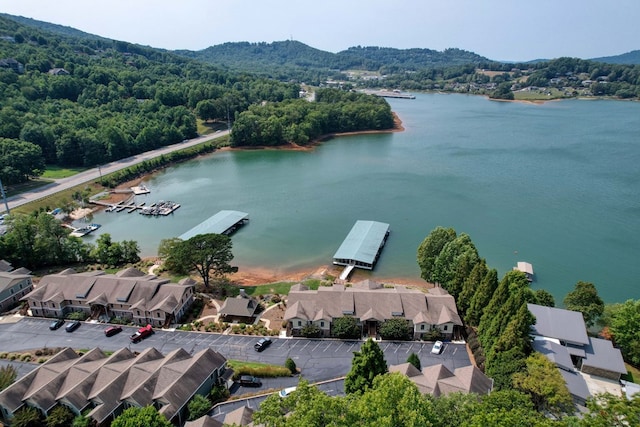 bird's eye view featuring a residential view and a water view