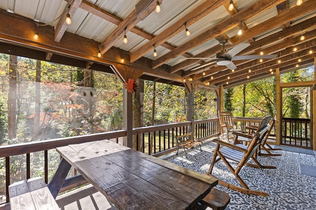 wooden terrace featuring ceiling fan