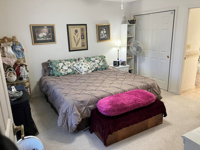 bedroom featuring a closet and carpet