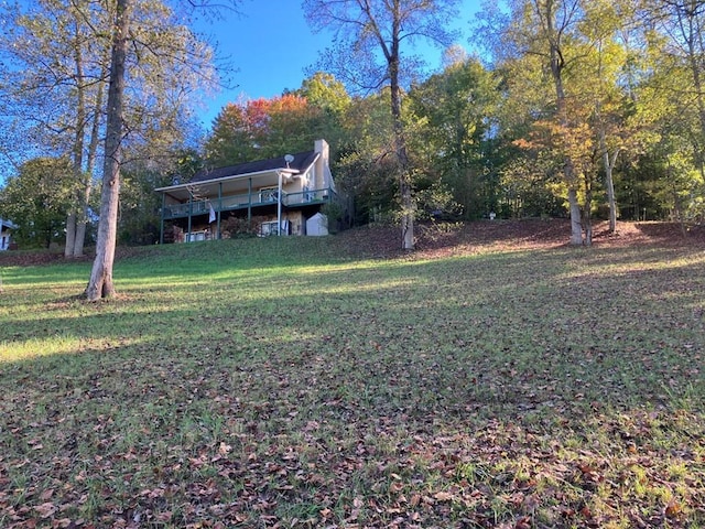 view of yard with a deck