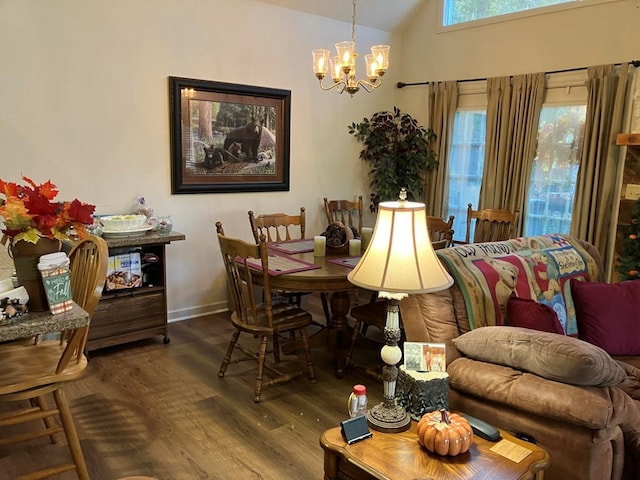 dining room featuring a chandelier, vaulted ceiling, and dark hardwood / wood-style flooring