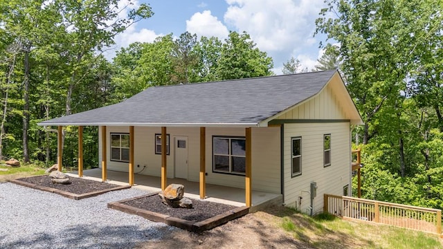 2562 Raven Cliff Rd, Ellijay, GA 30175 - view of front of property with a shingled roof, board and batten siding, and a patio area