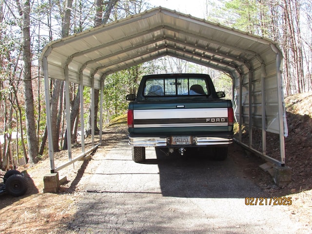 view of parking featuring a detached carport