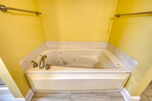 bathroom with a washtub