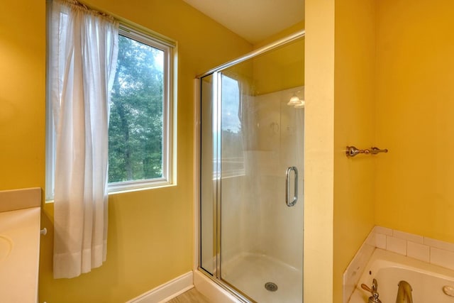 bathroom with independent shower and bath