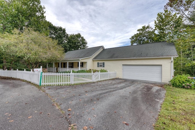 single story home with a garage