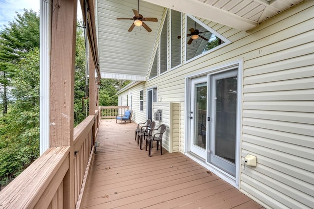 wooden terrace featuring ceiling fan