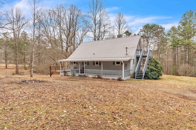 view of front of property with a wooden deck