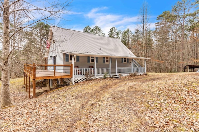 view of front of house with a porch and a deck