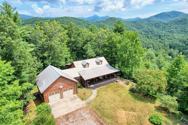 drone / aerial view featuring a mountain view