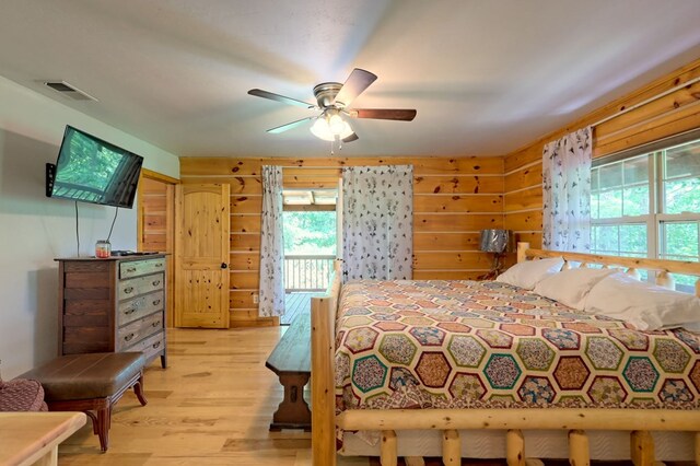 bedroom with light hardwood / wood-style floors and ceiling fan