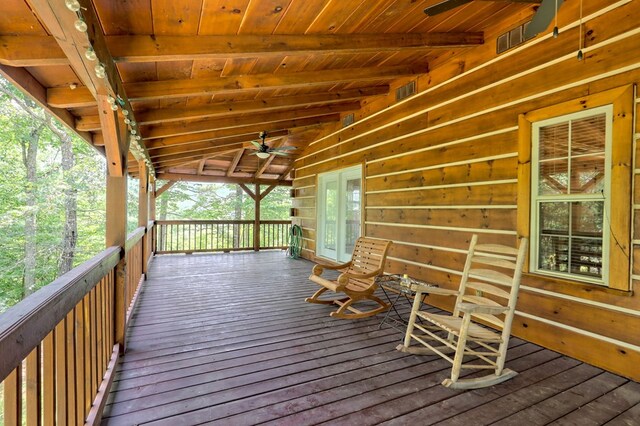 wooden deck with ceiling fan