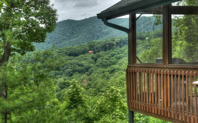 view of mountain feature with a view of trees