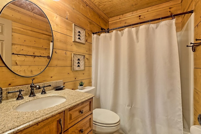 full bathroom with vanity, a shower with shower curtain, wooden walls, wood ceiling, and toilet