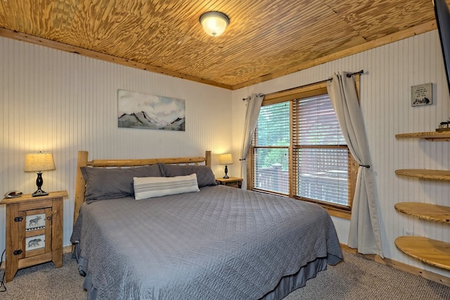 carpeted bedroom featuring wood ceiling