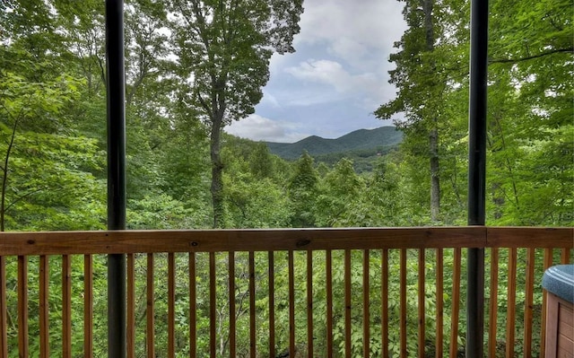 property view of mountains with a wooded view