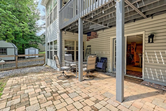 view of patio with a shed