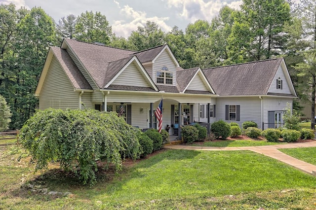 view of front of home featuring a front lawn and a porch