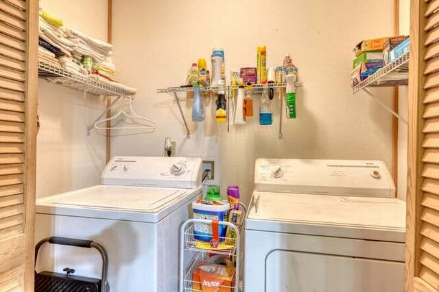 laundry area with washer and clothes dryer