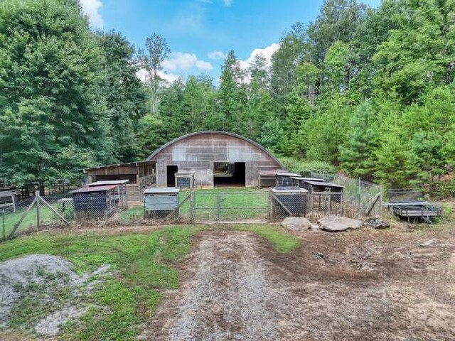 exterior space with an outbuilding