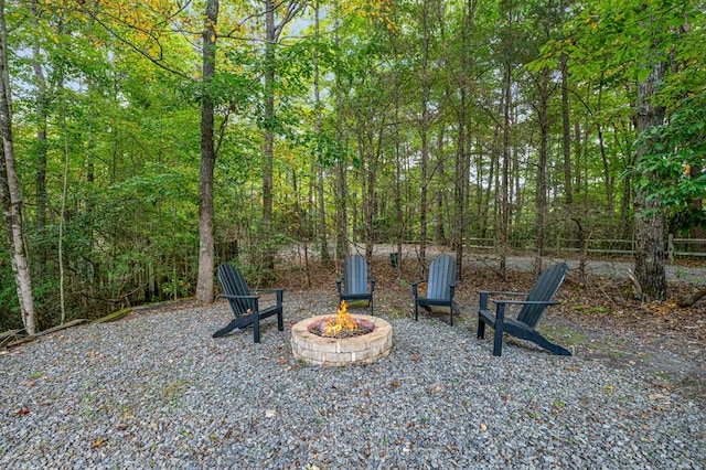 view of patio / terrace featuring an outdoor fire pit