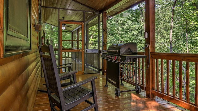 sunroom / solarium with wood ceiling