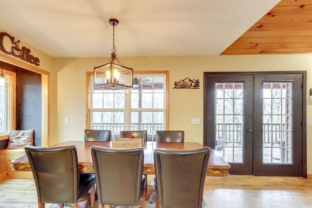 38 Smoky Mtn Rdg, Marble, NC 28905 - dining area with french doors, a chandelier, and wood finished floors