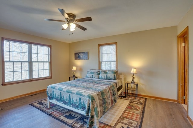 38 Smoky Mtn Rdg, Marble, NC 28905 - bedroom featuring wood finished floors, baseboards, and a ceiling fan