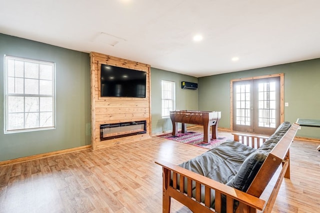 38 Smoky Mtn Rdg, Marble, NC 28905 - living room with light wood-style flooring, baseboards, recessed lighting, an AC wall unit, and a fireplace