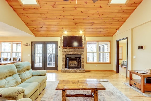 38 Smoky Mtn Rdg, Marble, NC 28905 - living room with a skylight, vaulted ceiling, light wood-type flooring, plenty of natural light, and wood ceiling
