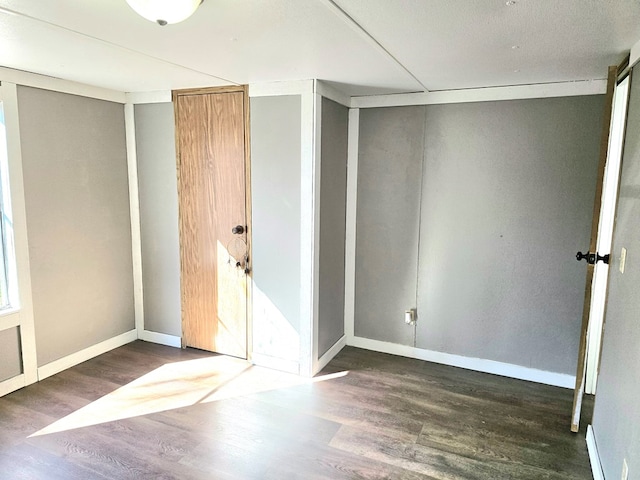 interior space with dark wood-type flooring