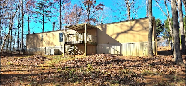 rear view of property with a deck