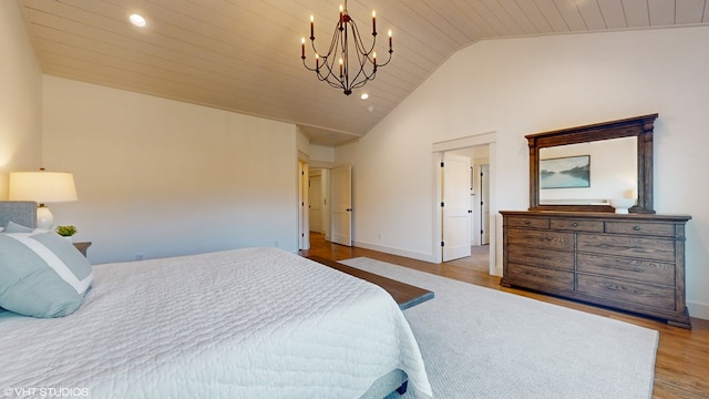 bedroom featuring a chandelier, wooden ceiling, wood-type flooring, and lofted ceiling