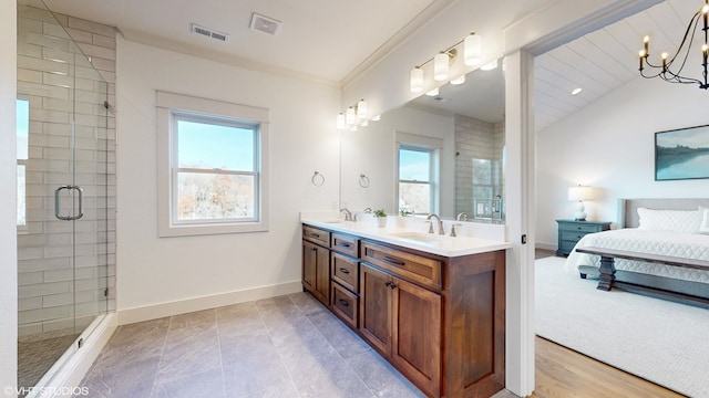 bathroom with vanity, vaulted ceiling, an enclosed shower, and a notable chandelier