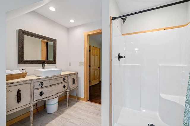 bathroom with sink and a shower