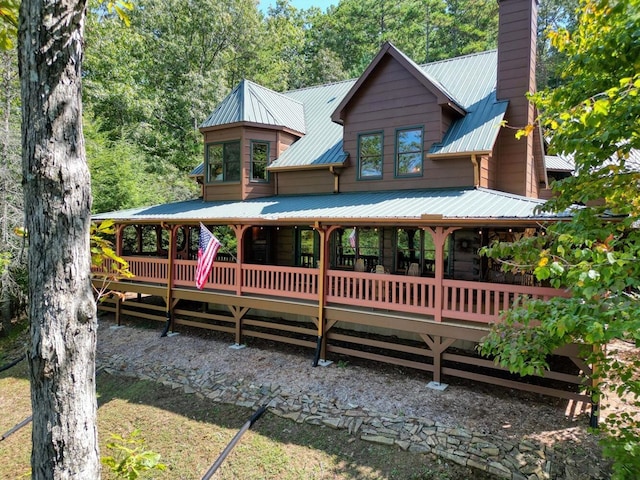 rear view of house with a deck