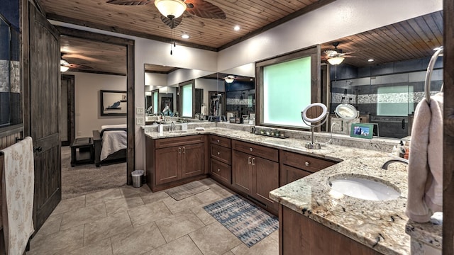 full bathroom with a sink, wooden ceiling, a shower stall, a ceiling fan, and double vanity