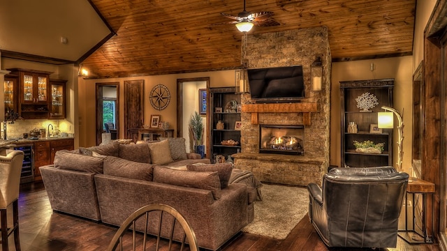 living room with wood ceiling, wet bar, a ceiling fan, and beverage cooler