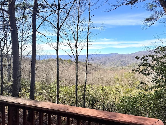 view of mountain feature featuring a view of trees