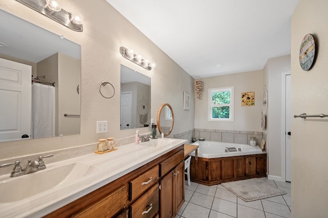bathroom featuring tile patterned flooring, double vanity, and a garden tub