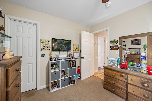 carpeted bedroom with baseboards