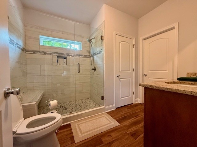 405 Lola Dr, Blairsville, GA 30512 - full bath with toilet, a shower stall, wood finished floors, and vanity