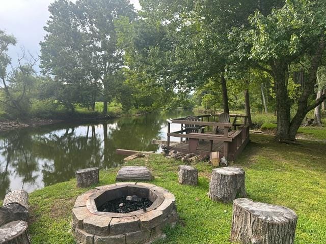 405 Lola Dr, Blairsville, GA 30512 - dock featuring an outdoor fire pit, a water view, and a lawn